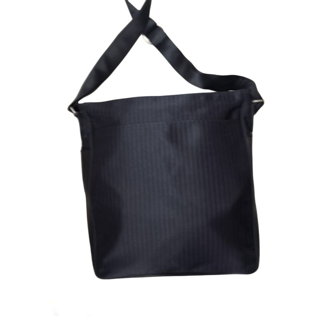 Nikon Messenger Bag (Black) (Category: Camera Bags & Carriers) located in General Mariano Alvarez. Submitted by hundred_lives (Listing ID 1451086993, Image 3). Description: Nikon Messenger Bag (Black) Authentic Original Excellent Condition Good As New ‼️***Or Best Offer Wins***‼️ ‼️***Split Or As Pack***‼️ ‼️***Negotiable All Items***‼️ Tags: burberry fendi mcm givenchy yohji yamamoto rick owens prada dolce & gabbana channel gucci hermès balencia
