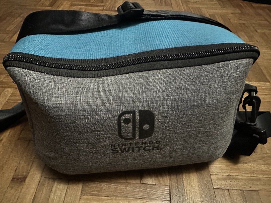 Nintendo Switch (Neon Red/Blue) Full Set with Travel Bag (Category: Nintendo) located in Rizal. Submitted by frugaliving (Listing ID 1451089430, Image 3). Description: Selling my pre-loved **Nintendo Switch (Neon Red/Blue)** package! Everything you need to play on the go or docked to your TV is included. **📦 What’s Included:** * Nintendo Switch Console (Screen protected) * Joy-Con Controllers (Left Neon Blue / Right Neon Red) * Joy-Con Analog Ca