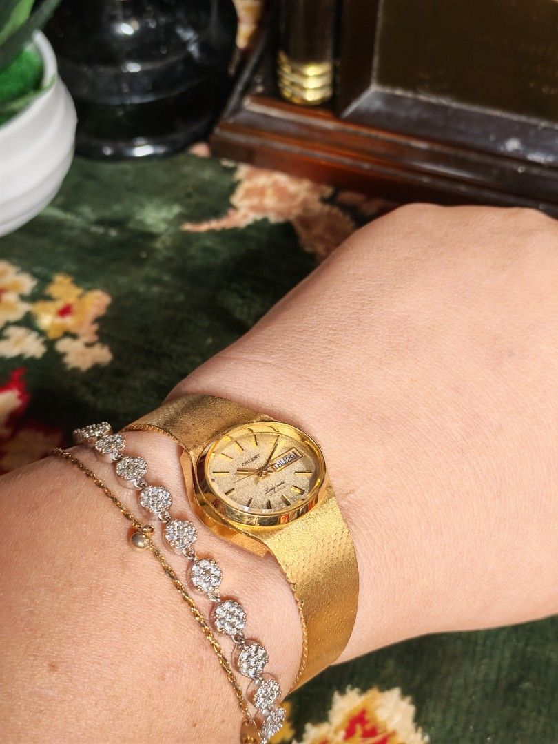 Vintage Orient Ladymatic 21 Jewels (Gold) (Category: Women's Watches) located in Trece Martires City. Submitted by heirloomhoursph (Listing ID 1451123033, Image 2). Description: ✨ Heirloom Hours – Available Piece ✨ Orient Ladymatic 21 Jewels Automatic Watch (Gold) Php 4,999 + sf Details: ■ Brand/Series: Orient ■ Model Number: I239404-30 ■ Movement: Automatic ■ Design Origin: Japan ■ Case Back Material: Stainless Steel ■ Case Size: 25mm ■ Wrist Si