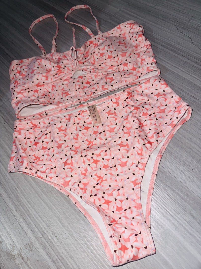 Pink Floral High Waisted Bikini Set (Category: Bikinis & Swimsuits) located in Manila. Submitted by _dyclutter (Listing ID 1451121155, Image 2). Description: • Adorable pink floral bikini set •No ww, never been used • Flattering high-waisted bottoms • Top features adjustable straps and tie-front detail • Ideal for beach days and pool parties • Comfortable and stylish design • Perfect for your next vacation!.