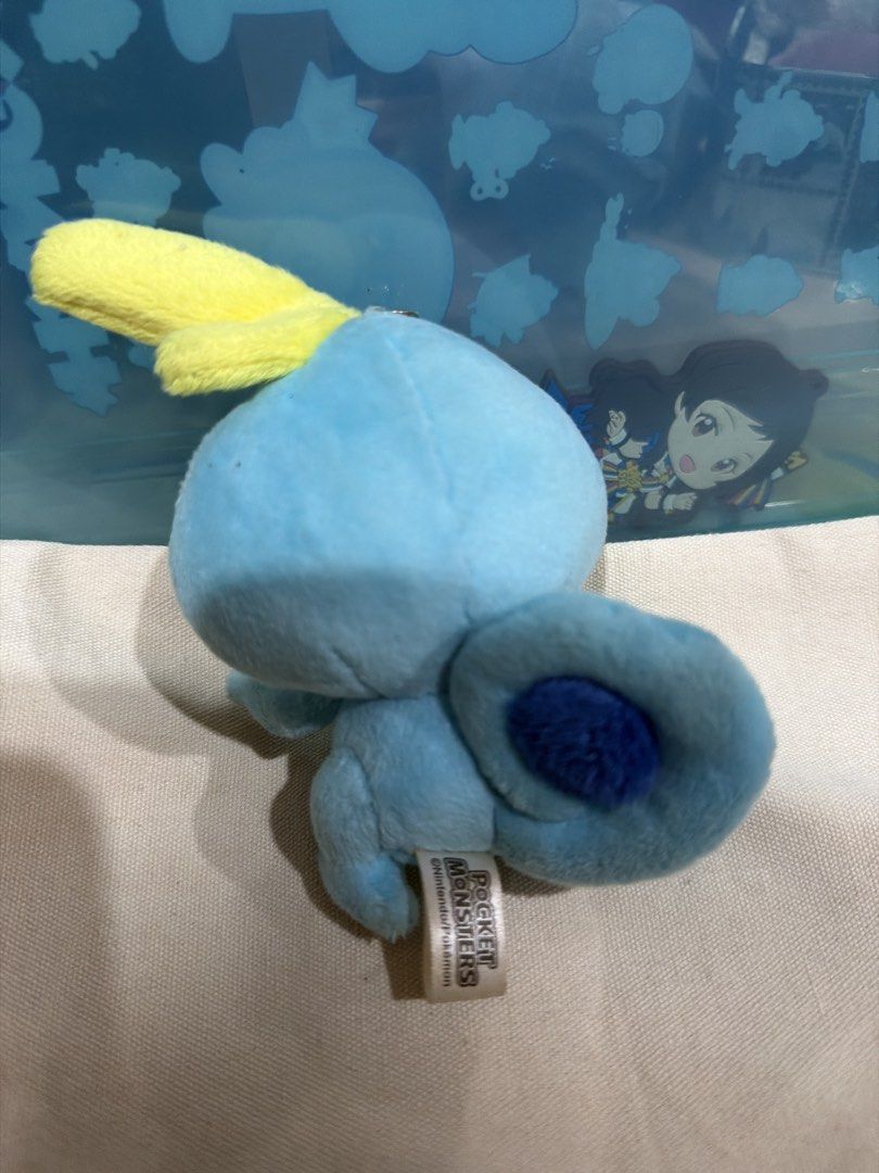 Pokemon Sobble Plush Keychain (Category: Toys & Games) located in Kuala Lumpur. Submitted by lisatoys (Listing ID 1451073872, Image 2). Description: - Adorable Sobble plush toy - Features a convenient keychain attachment - Ideal for Pokemon enthusiasts - Compact and portable size - Great for decorating bags, backpacks, and more!.