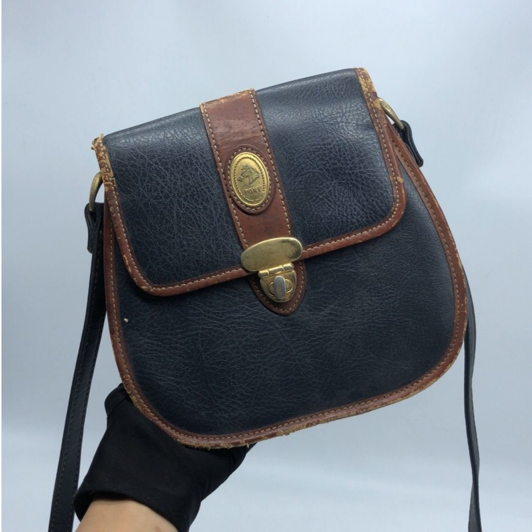 PONY BLUE FLAP SLING BAG (Category: Luxury Bags & Wallets) located in Taguig. Submitted by ecoring.ph (Listing ID 1450963269, Image 1). Description: ◆CONDITION: BC ◆DESCRIPTIONS: (Other defects/info:) OUTER: The body of the bag is scratched, scuffed, stained, dirty, deformed, marked with pressure imprints, wrinkled, and shows signs of use. The leather lining of the bag is scratched, scuffed, stained, dirty, chipped, wrinkled, peeling, cracked, to