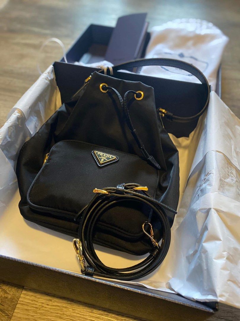 Prada Duet Re-Nylon Bucket Bag (Category: Luxury Bags & Wallets) located in Mandaluyong City. Submitted by petuniaisobel (Listing ID 1451010051, Image 2). Description: Brand New in Box with receipt. Can do meet-up in EDSA Shangrila or UP Town Center..