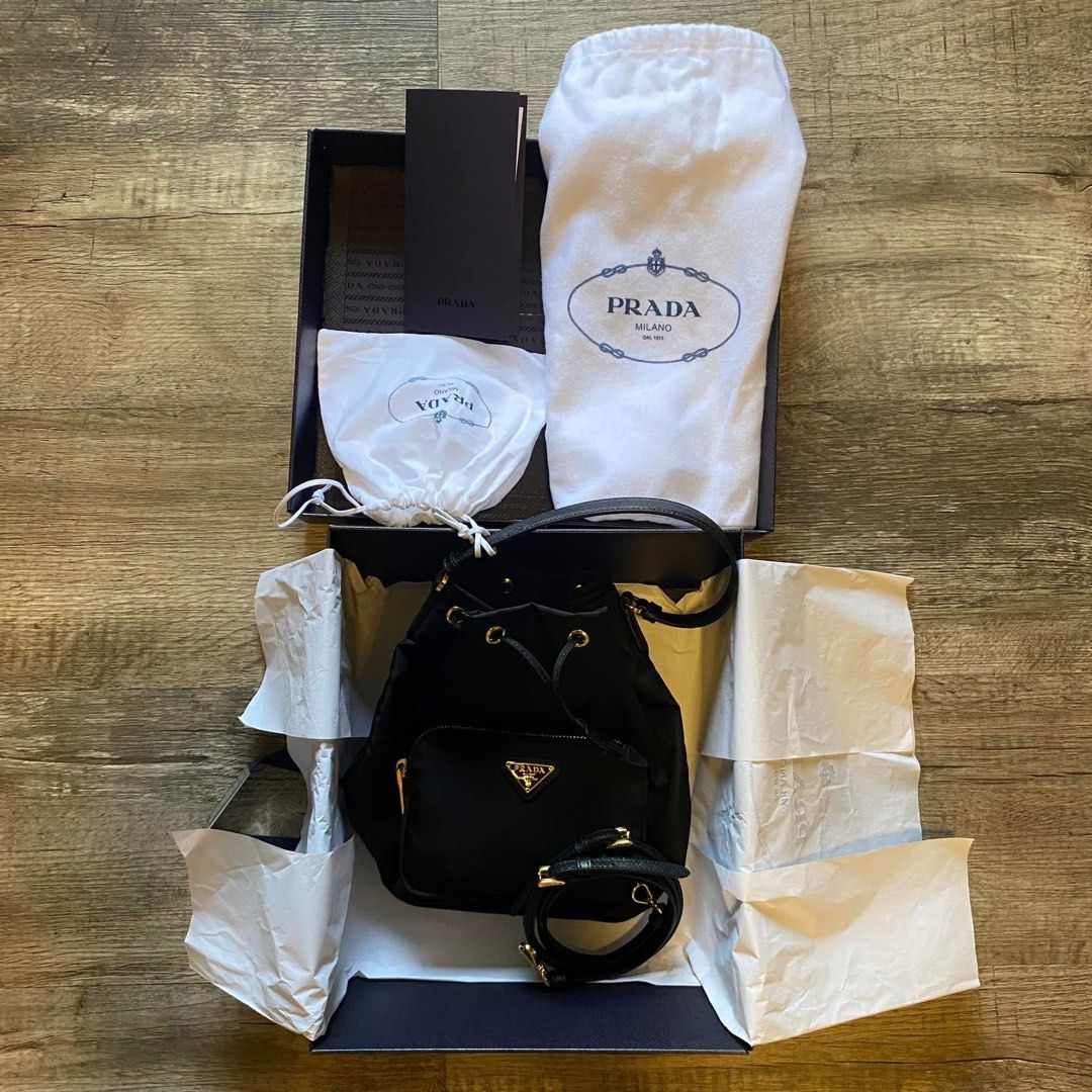 Prada Duet Re-Nylon Bucket Bag (Category: Luxury Bags & Wallets) located in Mandaluyong City. Submitted by petuniaisobel (Listing ID 1451010051, Image 1). Description: Brand New in Box with receipt. Can do meet-up in EDSA Shangrila or UP Town Center..