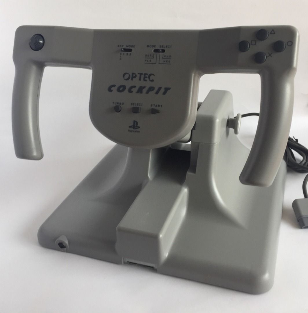 PS1 Optec Cockpit Controller SLPH 00024 (Category: PlayStation) located in Caloocan City. Submitted by Jorumack_Shop (Listing ID 1451058892, Image 2). Description: PS1 Optec Cockpit Controller SLPH 00024 Good Condition Tested and working Secondhand, almost new For PS1 ONLY (hindi gumagana sa PS2) Pwedeng gamitin for Racing games or use it just a regular controller Inclusions: • Cockpit Controller • Pedal • Box, damaged Issues: • Hairline scratche