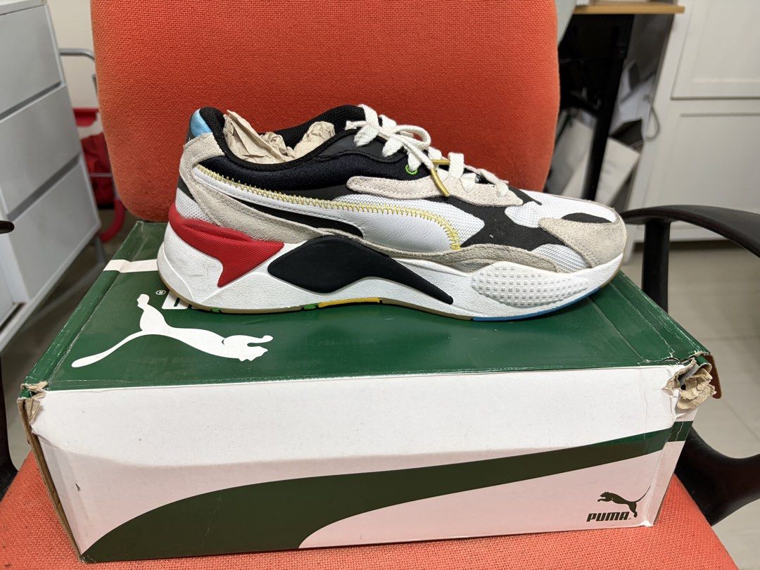 Puma RS-X3 WH Sneakers (Category: Sneakers) located in Manila. Submitted by joean21 (Listing ID 1451053495, Image 3). Description: - Puma RS-X3 sneakers - Colorway: White, black, and beige with red and blue accents - Includes original box (box has wear and tear) - Shoes are in clean condition.