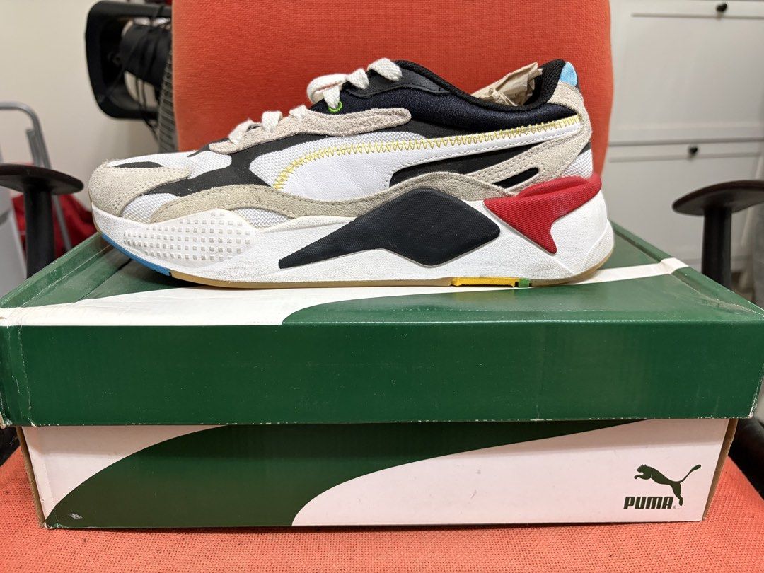 Puma RS-X3 WH Sneakers (Category: Sneakers) located in Manila. Submitted by joean21 (Listing ID 1451053495, Image 1). Description: - Puma RS-X3 sneakers - Colorway: White, black, and beige with red and blue accents - Includes original box (box has wear and tear) - Shoes are in clean condition.