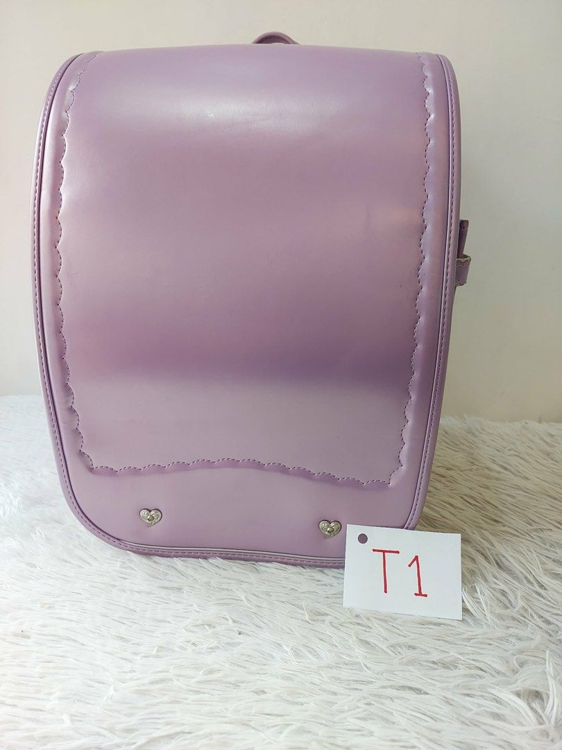 Randoseru Backpack - Japanese School Bag (Category: Backpacks) located in Pasay City. Submitted by prinsesa20 (Listing ID 1451013575, Image 2). Description: - Authentic Randoseru Backpack design - Inspired by Japanese school bags - Durable construction for everyday use - Available in multiple colors: Lavender, Red, Black, Dark Blue, Pink - Stylish and functional for students.