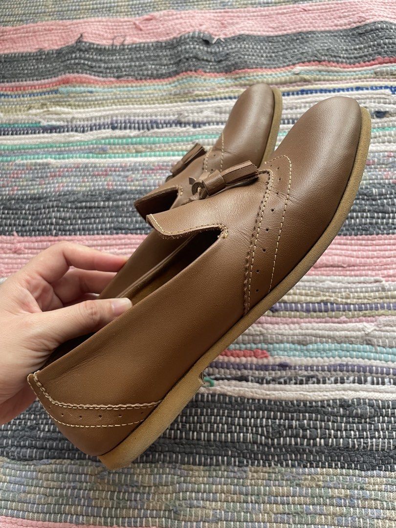 Rob & Mara Genuine Leather Tassel Loafers (Category: Loafers) located in Las Pinas. Submitted by serialthrifter (Listing ID 1450970108, Image 2). Description: - Brand: Rob & Mara - Color: Brown - Material: Genuine Leather - Style: Loafers with tassel detail, classic slip-on - Occasion: Casual or smart casual wear - Condition: Soles show some signs of wear, but plenty of life left. - Size: 6-6.5 Super comfy! Price negotiable. RFS: need funds for s