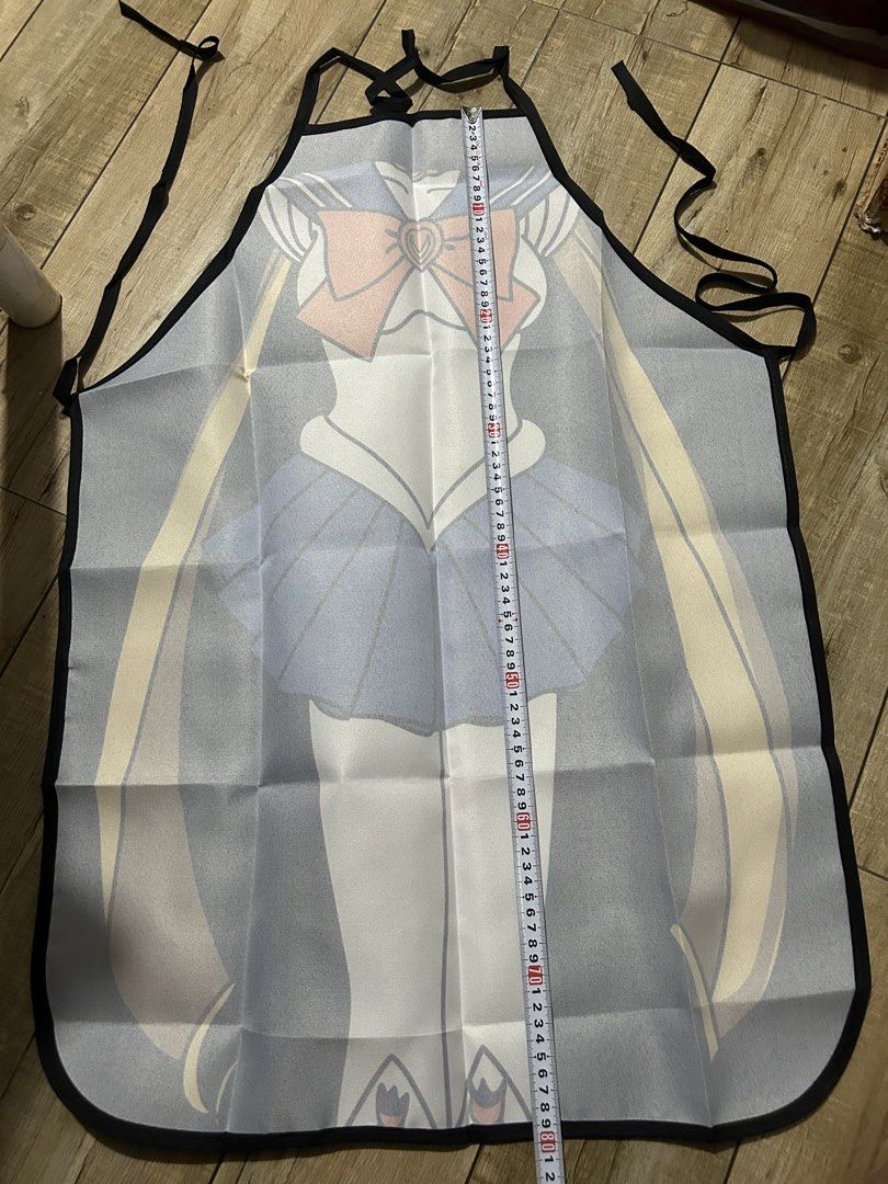 Sailor Moon Inspired Apron Cosplay (Category: Coats, Jackets and Outerwear) located in Paranaque City. Submitted by zac.sei (Listing ID 1450996614, Image 3). Description: - Cute Sailor Moon inspired apron - Ideal for cooking or as a costume - Adjustable tie-back for a perfect fit - Fun and unique design for fans - Approximately 75cm in length - Made with easy-to-clean material.