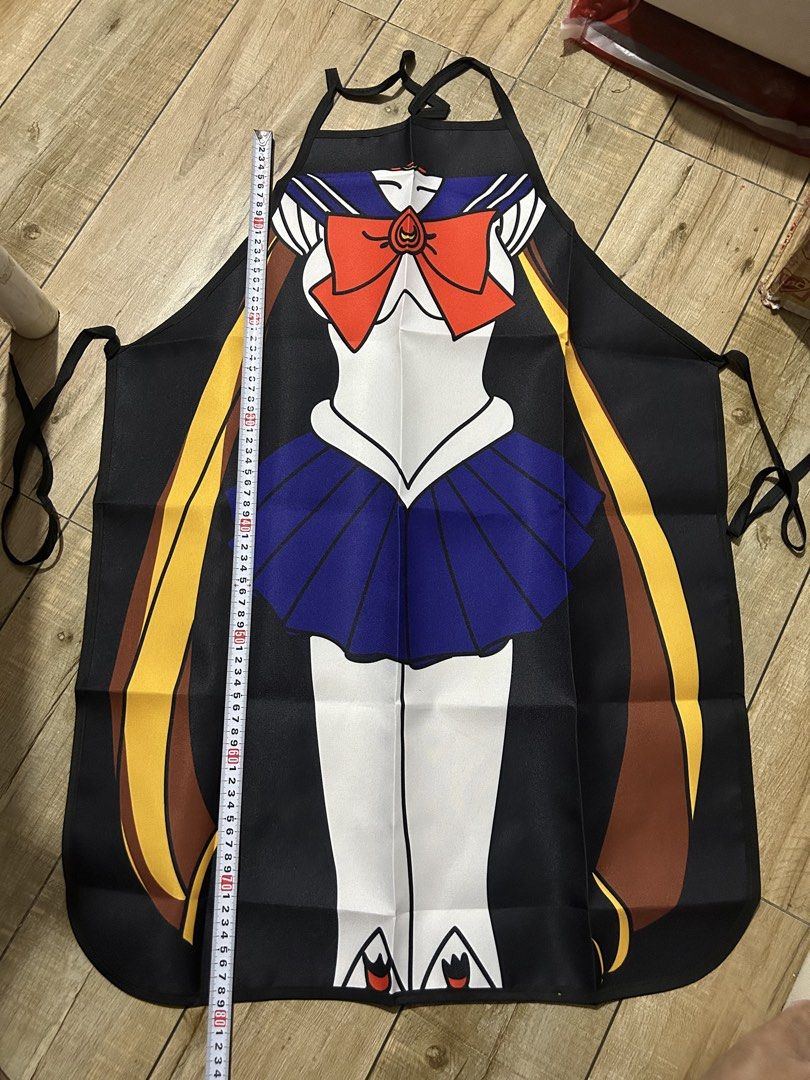 Sailor Moon Inspired Apron Cosplay (Category: Coats, Jackets and Outerwear) located in Paranaque City. Submitted by zac.sei (Listing ID 1450996614, Image 1). Description: - Cute Sailor Moon inspired apron - Ideal for cooking or as a costume - Adjustable tie-back for a perfect fit - Fun and unique design for fans - Approximately 75cm in length - Made with easy-to-clean material.