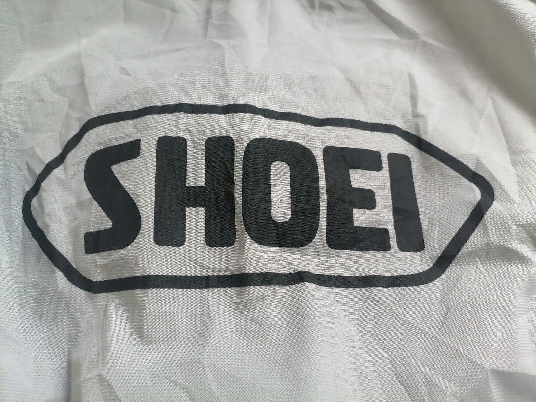Shoei Helmet Bag free size (Category: Helmets and other Riding Gears) located in Cagayan de Oro. Submitted by emma3782 (Listing ID 1451021714, Image 3). Description: - Light grey Shoei helmet bag - Protects helmet from scratches and dust - Perfect for storage or transport - Fits most Shoei helmets - Essential accessory for your Shoei helmet.