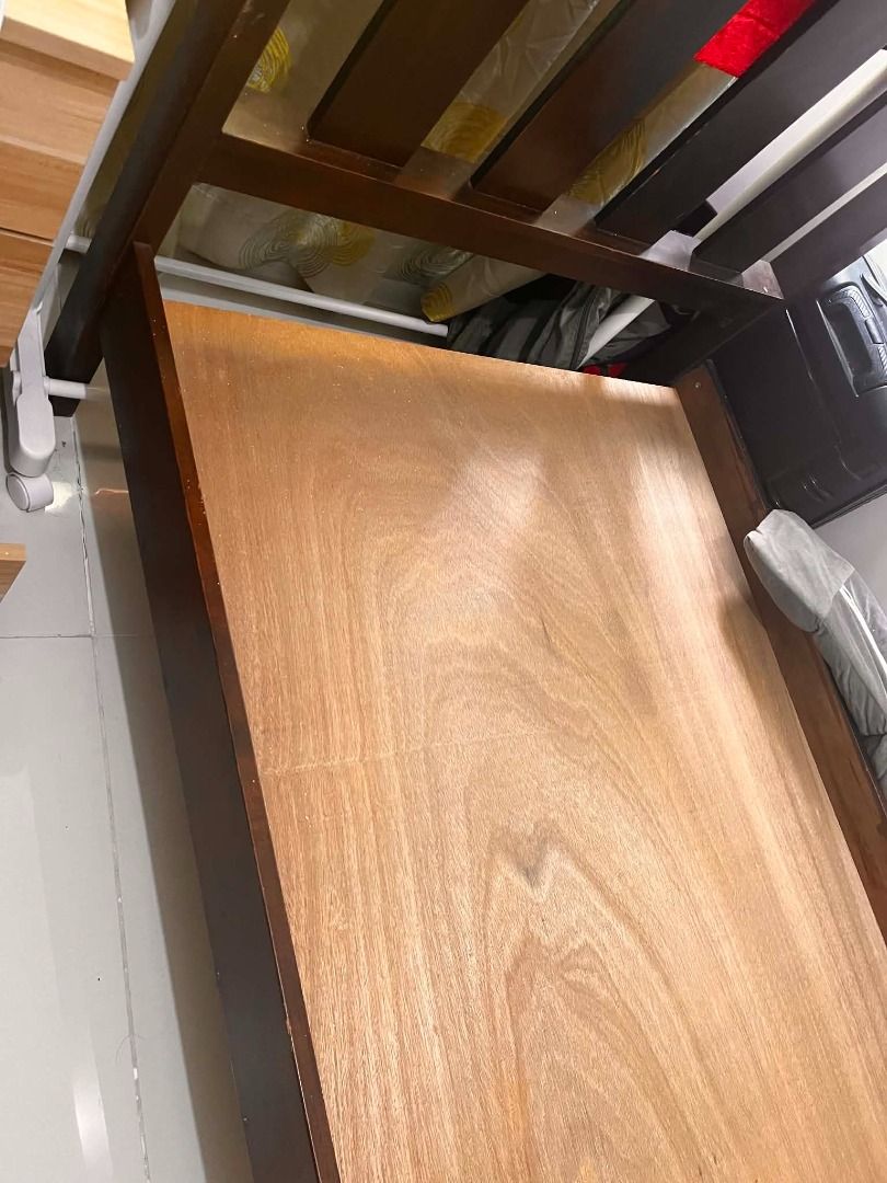 Single Bed frame (Category: Bed Frames & Mattresses) located in Paranaque City. Submitted by dreyv (Listing ID 1450595105, Image 2). Description: Bedframe: W=38 inch L=80 inch H=13 inch Headboard height=36 inches Defect: Sira yung isang rib sa paa. May plywood to support weight Negotiable RFS: will buy new bed frame.