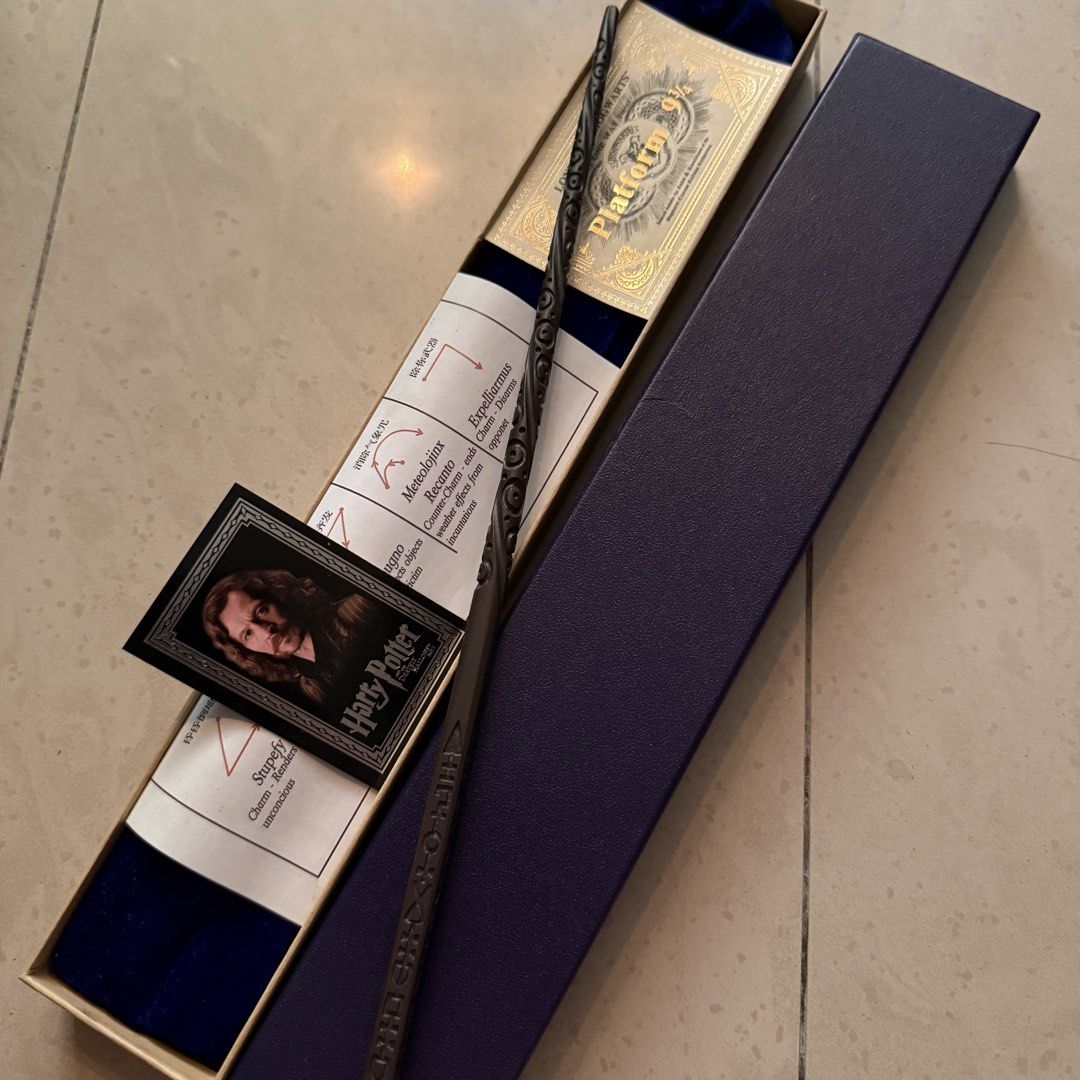Sirius Black Wand - Harry Potter Collectable (Category: Fan Merchandise) located in Kuala Lumpur. Submitted by raisqil (Listing ID 1451000070, Image 2). Description: Harry Potter themed wand, great for fans and collectors. Comes with original box, spell info card, and character card. What’s included: • Wand (good condition) • Branded box with velvet lining • Spell reference card (Stupefy, Expelliarmus, Meteolojinx, etc.) • Character portrait card