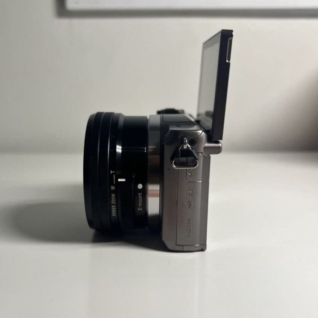 Sony Alpha A5100 Mirrorless Camera (Category: Cameras) located in Carmona. Submitted by chewychicken (Listing ID 1451025721, Image 2). Description: - Sony Alpha mirrorless camera - Includes E PZ 16-50mm OSS lens - Flip-up screen for easy vlogging and selfies - Excellent for both photography and videography - Compact and lightweight design - Ideal for travel and everyday adventures Inclusions: - Box - Manuals - Camera - Camera lens - 2x original b
