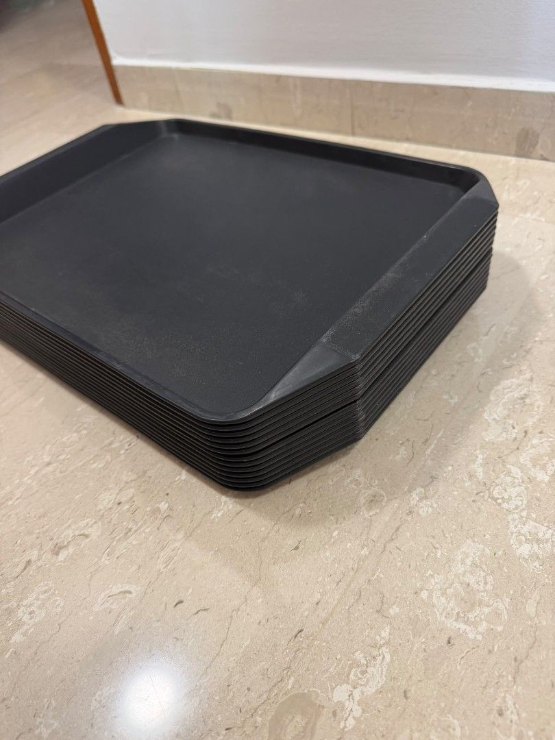 Stackable Black Serving Trays (Category: Storage Boxes & Baskets) located in Singapore. Submitted by genio07 (Listing ID 1450995160, Image 1). Description: - 50 pieces @$65 - 20 pieces @$30 Take all 80 pieces for $100 - Stack of dark brown anti-slip serving trays - Sturdy and durable - Ideal for serving food and drinks - Easy to clean and store - Perfect for parties, events, and everyday use.