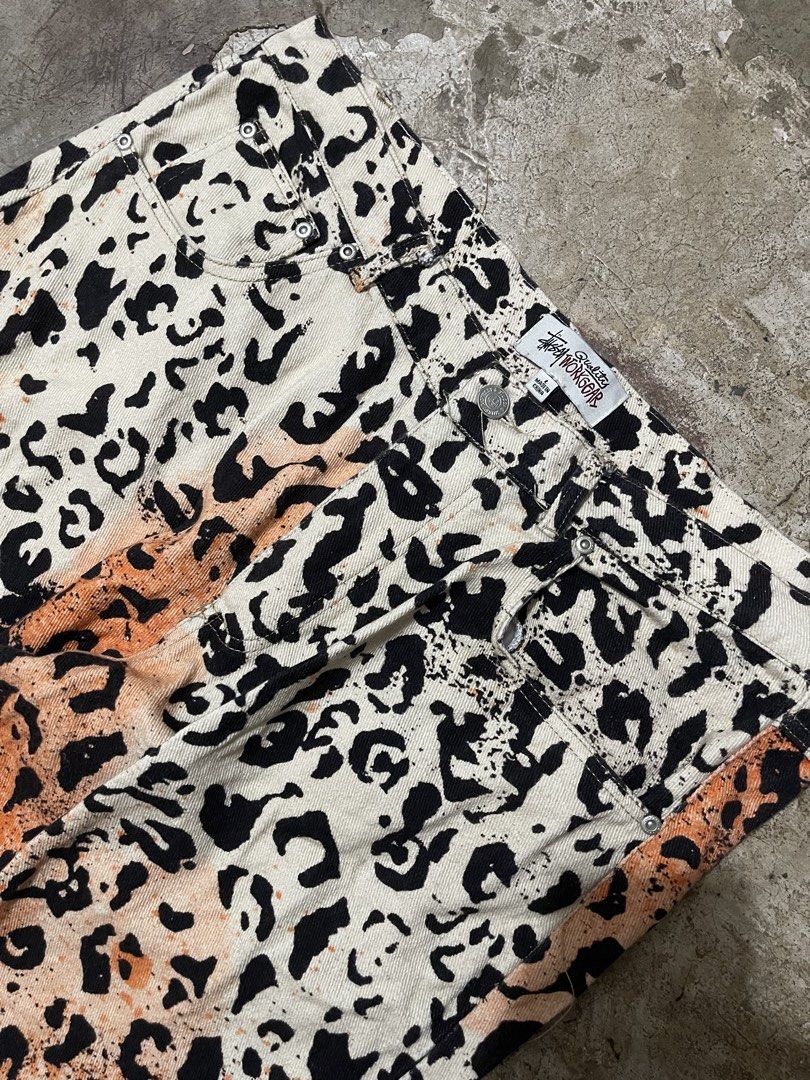 STUSSY Workgear Leopard Print Pants Size L (Category: Jeans) located in Manila. Submitted by jiahhncarl57791 (Listing ID 1451047505, Image 3). Description: - Stussy Workgear Pants - Eye-catching leopard print - Colorway: Black, beige, and orange - Closure: Button and zip - Origin: Made in China - Size: Large (L) - Perfect for adding a bold, edgy vibe to your outfit.