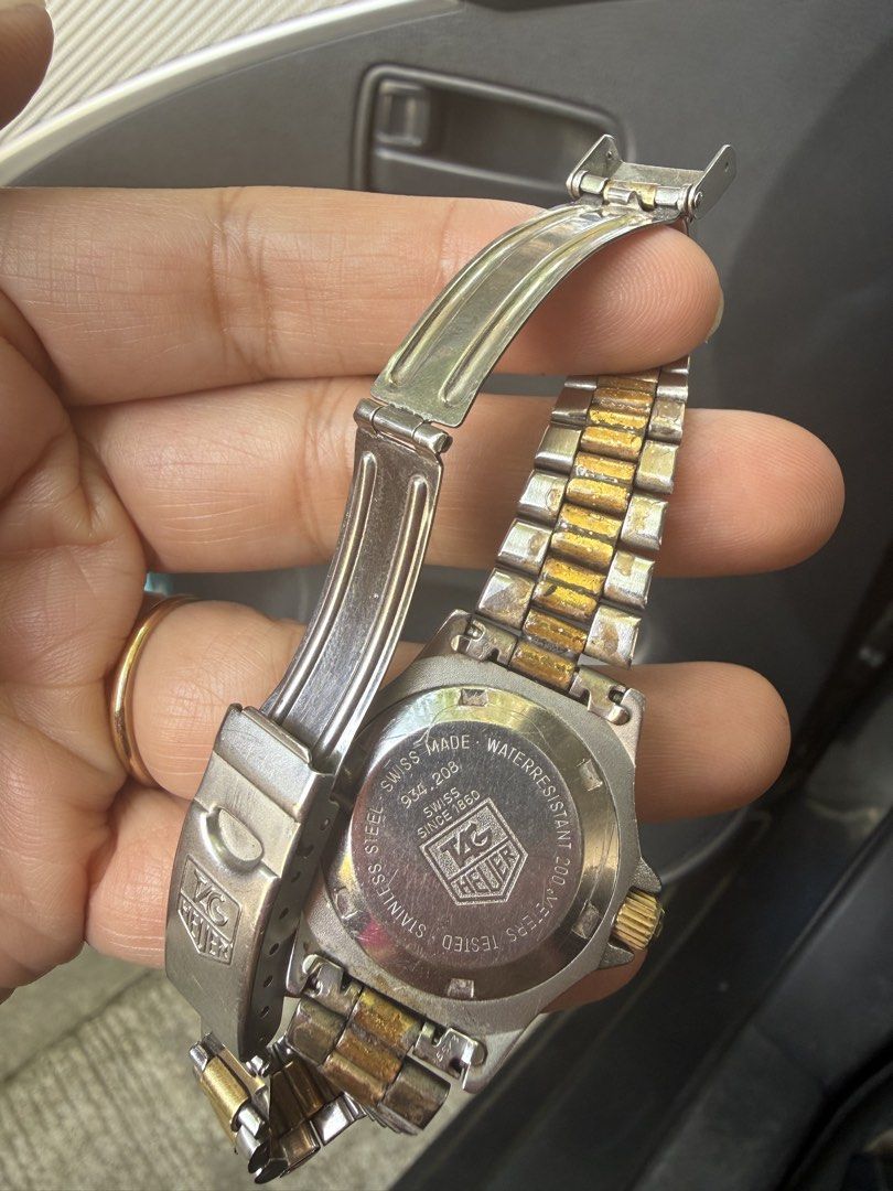TAG Heuer 2000 Two-Tone watch (Category: Luxury Watches) located in Bacolod City. Submitted by happyhoarding2ndaccount (Listing ID 1450949083, Image 3). Description: - Authentic TAG Heuer 2000 Watch - Two-tone Stainless Steel and Gold Bracelet - Rotating Bezel - Suitable for everyday wear and diving - Watch is running and in working condition.