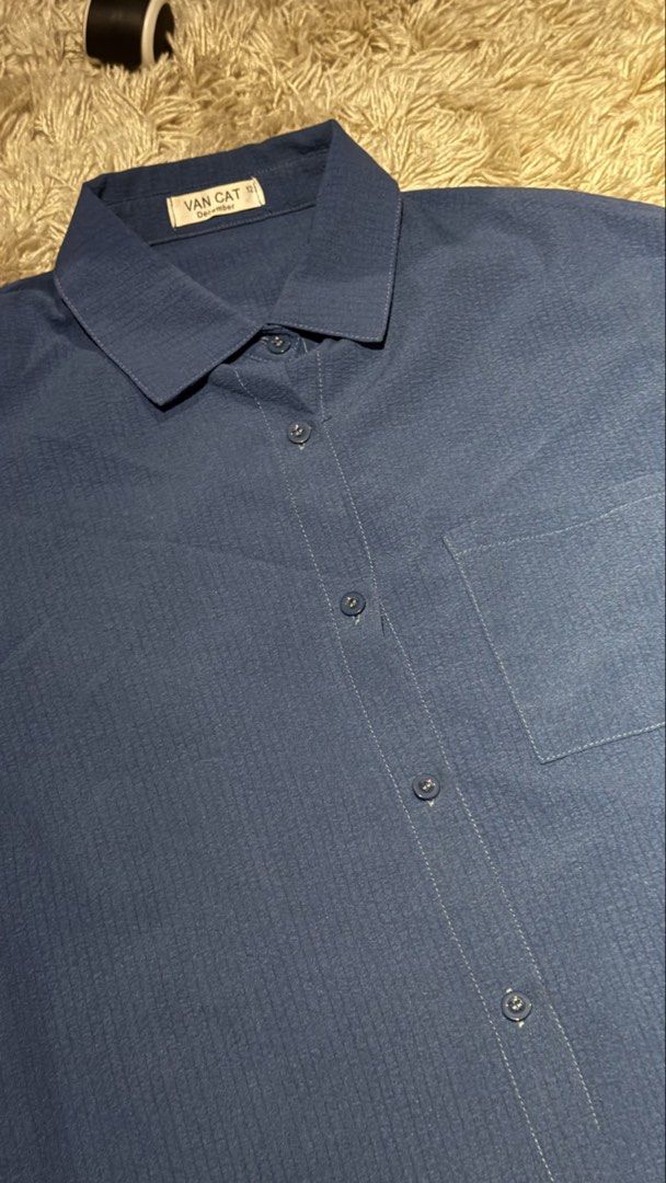 Textured Long Sleeve Button Up Polo (Category: Tshirts & Polo Shirts ) located in Manila. Submitted by kyle.daniel (Listing ID 1451077678, Image 3). Description: - VAN CAT Blue Long Sleeve Shirt - Size 12 - Subtle vertical stripe texture - Single chest pocket - Button-up front - Ideal for casual wear or layering Fits Medium-Small No issues.