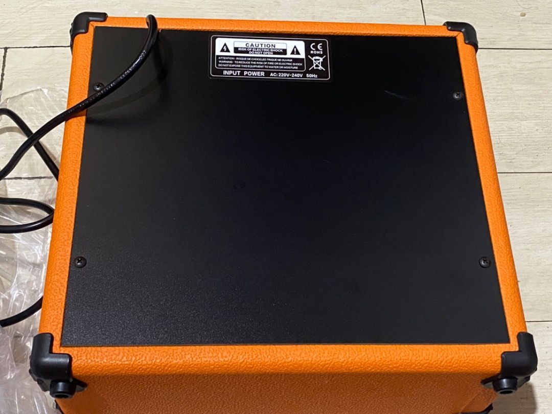 TG-15 Guitar Amplifier (Category: Soundbars, Speakers & Amplifiers) located in Caloocan City. Submitted by vastforest.a5fc8a (Listing ID 1451075787, Image 3). Description: - TG-15 Guitar Amplifier - Vibrant orange exterior - Ideal for practice and jamming - Features Volume, Drive, and Tone controls.