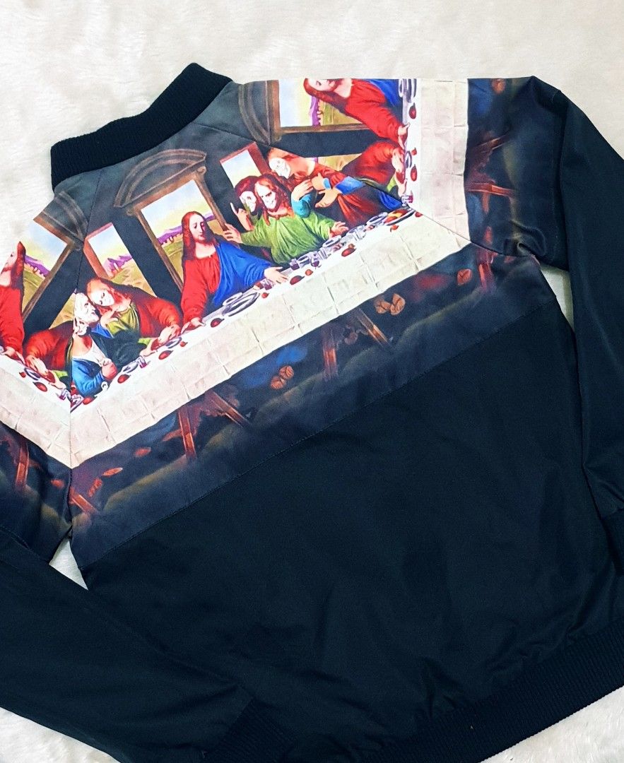 The Last Supper Jacket (Category: Coats, Jackets and Outerwear) located in Taguig. Submitted by thriftedminds (Listing ID 1451106874, Image 3). Description: Item: The Last Supper Jacket🔥 Size: Cut tag Width: 20.5 Length: 25 Condition: Excellent Issue: None DM to purchase 📩.