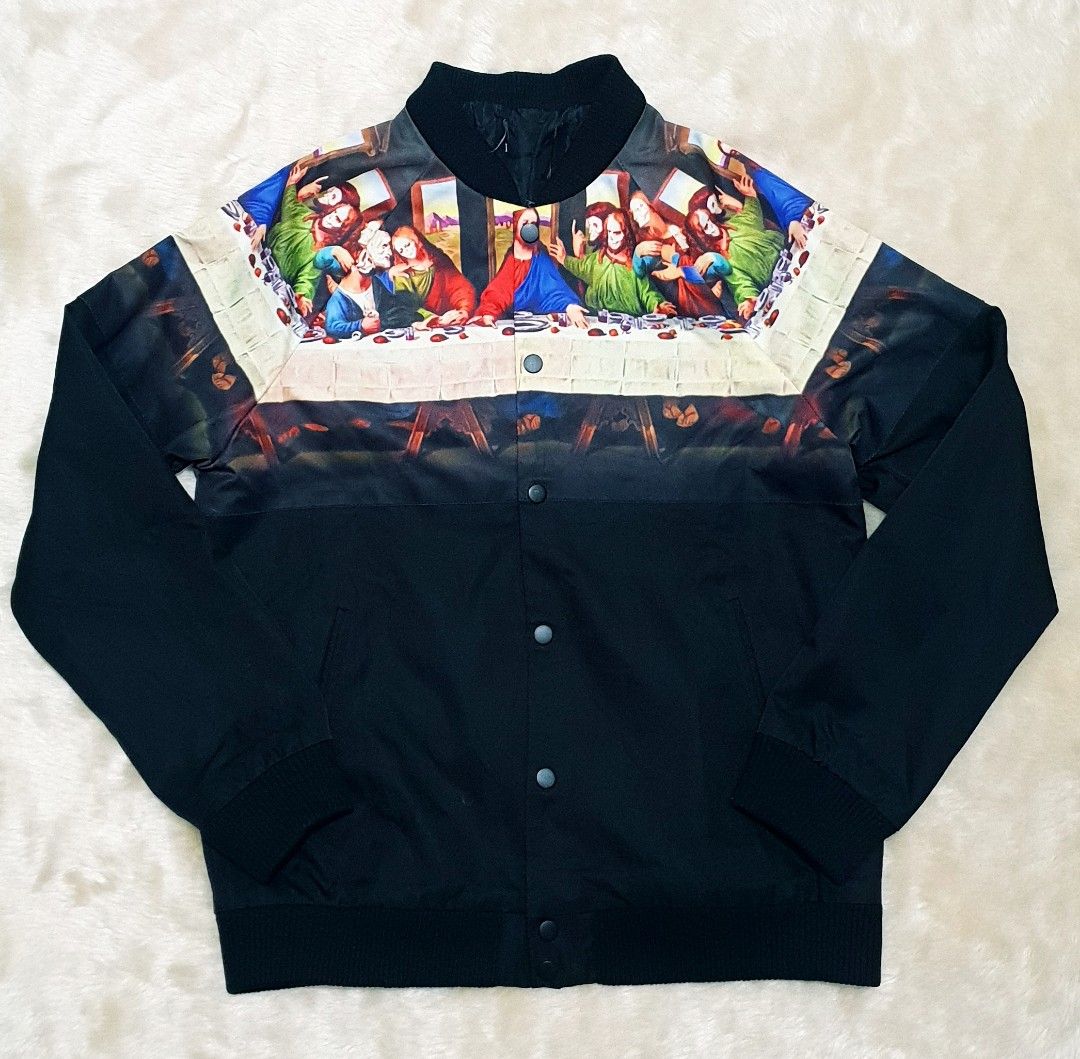 The Last Supper Jacket (Category: Coats, Jackets and Outerwear) located in Taguig. Submitted by thriftedminds (Listing ID 1451106874, Image 1). Description: Item: The Last Supper Jacket🔥 Size: Cut tag Width: 20.5 Length: 25 Condition: Excellent Issue: None DM to purchase 📩.