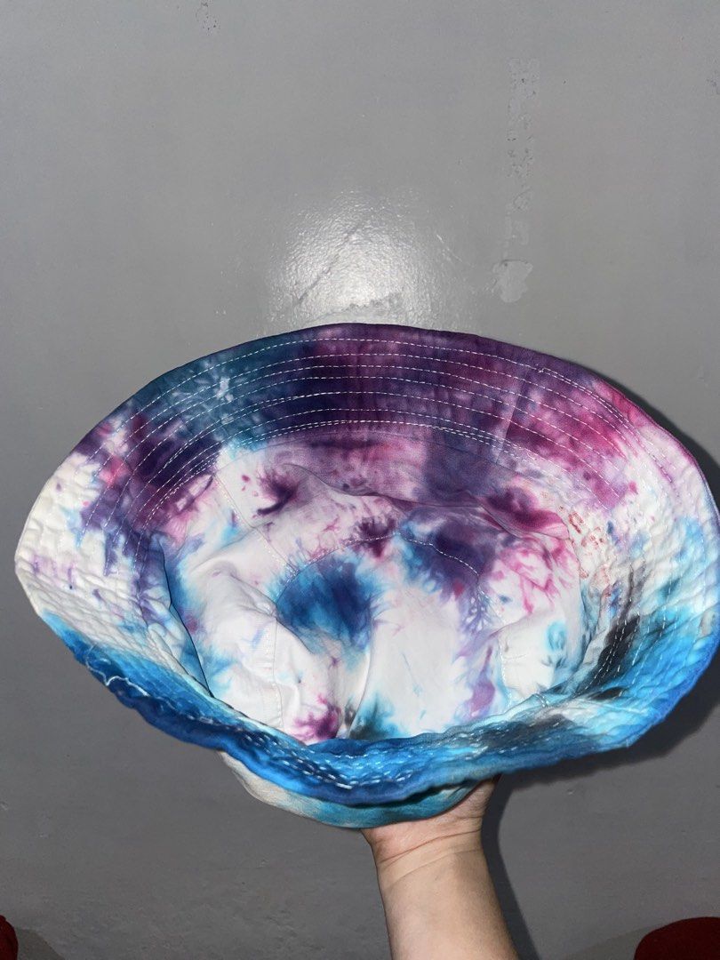 Tie-Dye Bucket Hat - Blue, Pink, Purple (Category: Hats & Beanies) located in Baguio. Submitted by everafterbgo (Listing ID 1451076305, Image 2). Description: - Unique tie-dye bucket hat - Features a cool blue, pink, and purple pattern - Ideal for sunny days, festivals, or everyday wear - Comfortable and stylish accessory - Adds a vibrant pop of color to any outfit.
