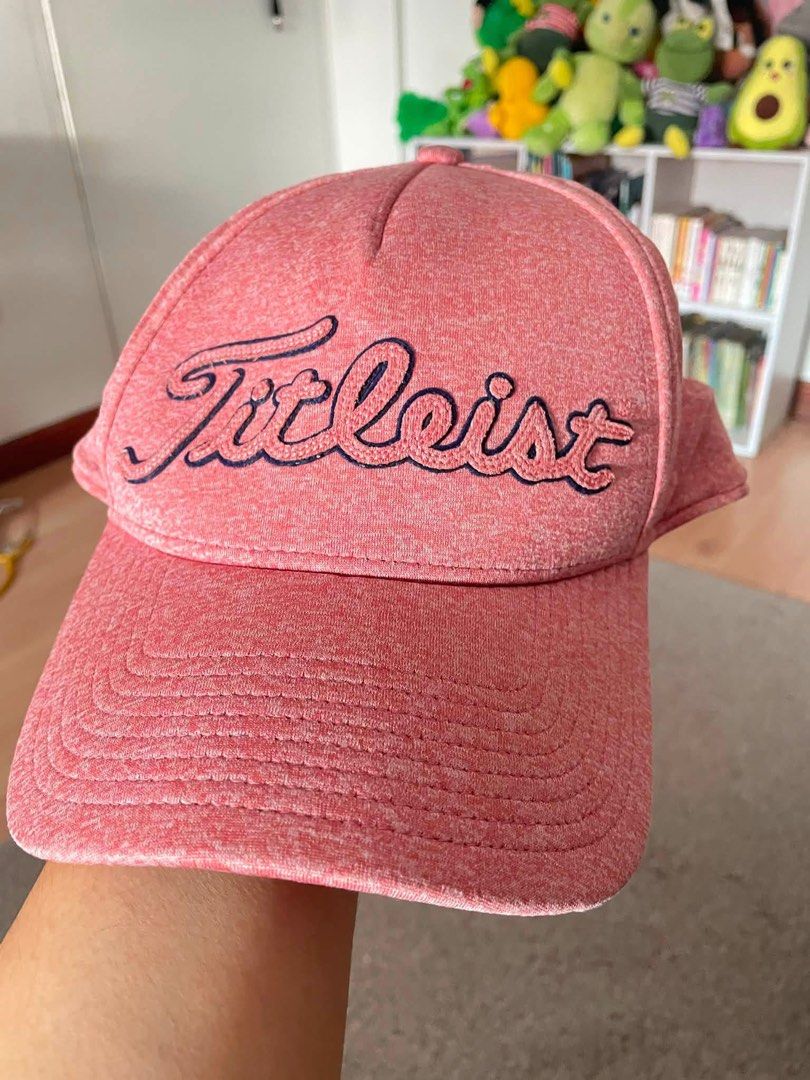 Titleist Golf Cap Hat Pink Heathered (Category: Caps & Hats) located in Cainta. Submitted by pnedp2022 (Listing ID 1450987904, Image 1). Description: - Pink heathered Titleist golf cap - Embroidered logo on front and side - Adjustable strap for a comfortable fit - Perfect for golf or casual wear - Condition 10/10 - Loc: Greenwoods Pasig/Cainta.