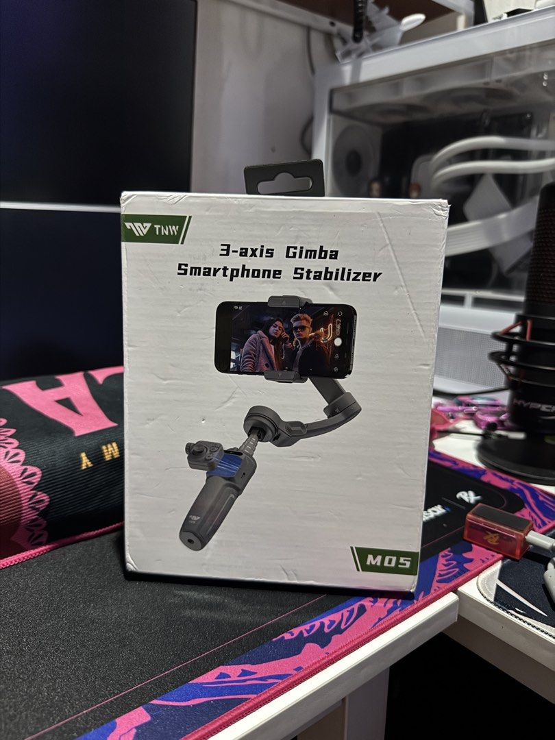 TNW MOS 3-axis Gimba Smartphone Stabilizer (Category: Gimbals & Stabilizers ) located in Manila. Submitted by kitty88888888 (Listing ID 1451109505, Image 2). Description: For Sale!! Tnw M05 Pro Gimbal Stabilizer Brand new never been used. Vinideohan lang 4k. Nego - Get super smooth video footage with the TNW MOS 3-axis gimbal stabilizer. - Easy to set up and use, perfect for beginners. - Comes with the original box for safekeeping. - Ideal for vl