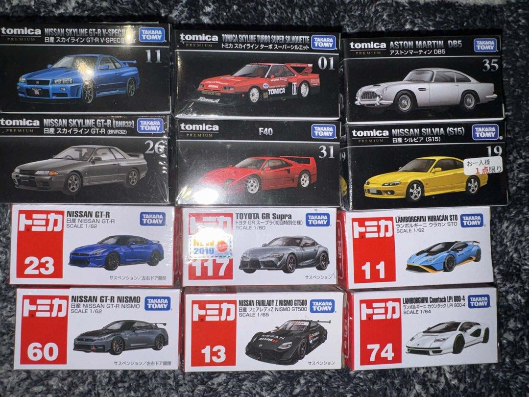 Tomica Premium Diecast Cars - Various Models (Category: Vehicle & Diecast Models) located in Quezon City. Submitted by lorelynabanilla (Listing ID 1451051009, Image 1). Description: - Collection of Tomica Premium diecast cars (Take all) - All original and good condition Models Included: - Nissan Skyline GT-R V-Spec - Nissan Skyline Turbo Super Silhouette - Aston Martin DB5 - Ferrari F40 - Nissan Skyline GT-R (BNR32) - Nissan Silvia S15 - Nissan G