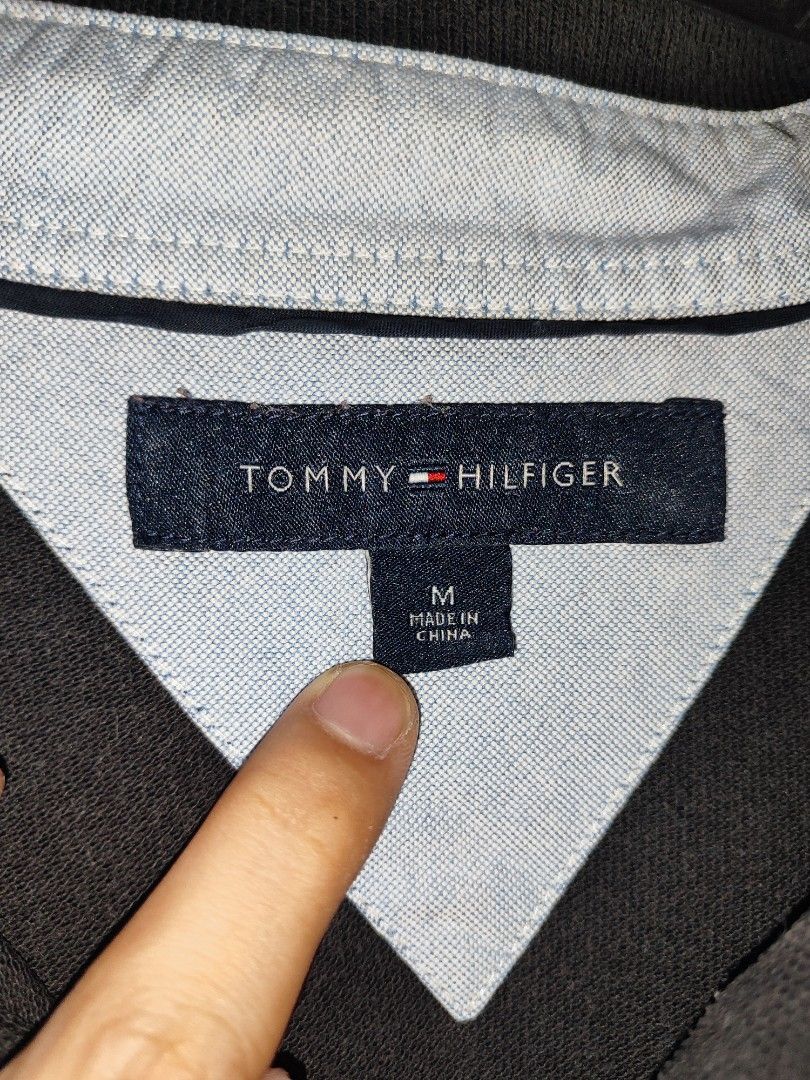 Tommy Hilfiger Black Polo Shirt (M) (Category: Tshirts & Polo Shirts ) located in Quezon City. Submitted by autodrop_ph (Listing ID 1451020413, Image 3). Description: Size: Medium Dimes. Width: 21 inches Length: 31 inches Excellent Condition..