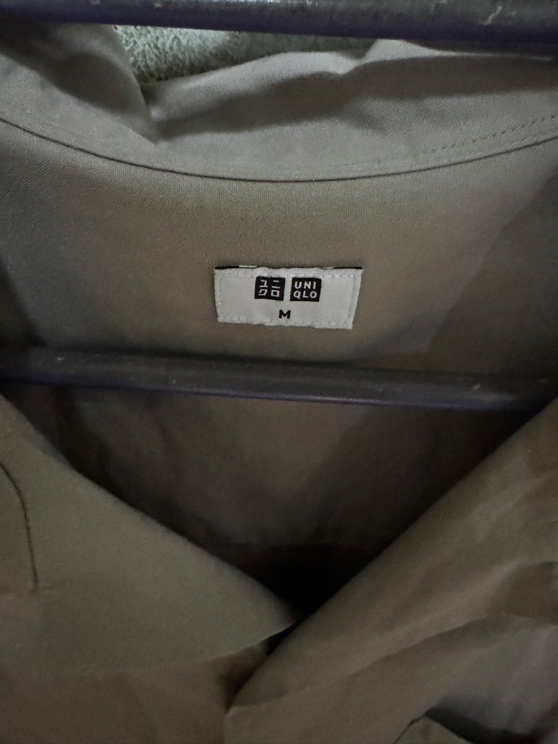 UNIQLO Khaki Button Up Polo (Medium) (Category: Tshirts & Polo Shirts ) located in Quezon City. Submitted by lemonsyellow (Listing ID 1451084981, Image 3). Description: UNIQLO Size Medium (M) RFS: Clearing out closet No Flaws QC BASED Shipping fee to be shouldered by buyer.