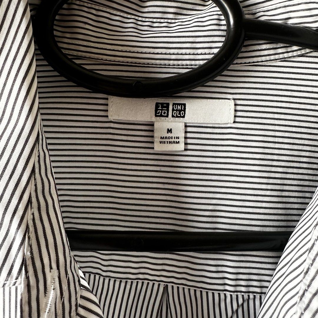 Uniqlo Striped Button-Up Shirt Size M (Category: Shirts) located in Pasig City. Submitted by funkypeach (Listing ID 1450974443, Image 2). Description: Uniqlo Long Sleeve Button down for SALE Color Pinstripe black and white Measurements 28” L x 17” W (shoulder) Sleeve length 22” Size M RFS: decluttering MOP Gcash Shipping at buyer’s expense Shipping via GGX or Lalamove .