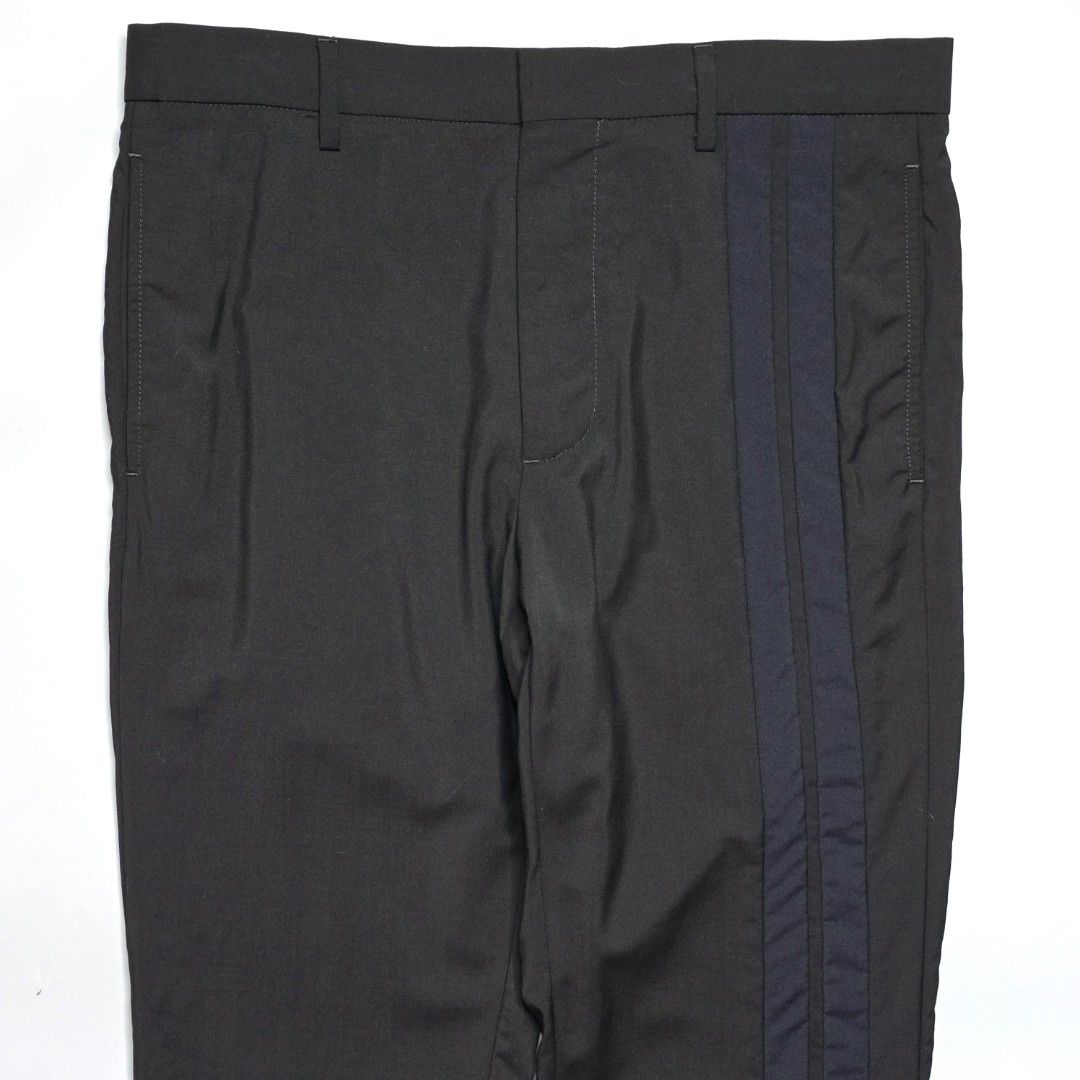 Valentino - Wool Mohair Side Stripe Trousers (Category: Trousers) located in Malabon City. Submitted by buynflex (Listing ID 1451040517, Image 3). Description: Valentino - Wool Mohair Side Stripe Trousers Size 48 Gently Used Very Good Condition Product Information Tapered wool and mohair-blend trousers in navy. Mid-rise. Four-pocket styling. Central creases at front and back. Technical twill trim in navy at outseams. Button-fly. Black-tone hardwa