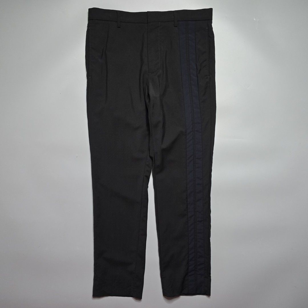 Valentino - Wool Mohair Side Stripe Trousers (Category: Trousers) located in Malabon City. Submitted by buynflex (Listing ID 1451040517, Image 1). Description: Valentino - Wool Mohair Side Stripe Trousers Size 48 Gently Used Very Good Condition Product Information Tapered wool and mohair-blend trousers in navy. Mid-rise. Four-pocket styling. Central creases at front and back. Technical twill trim in navy at outseams. Button-fly. Black-tone hardwa