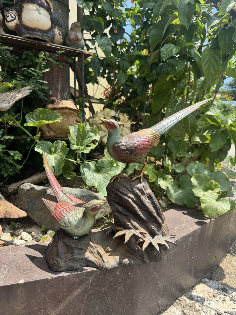 Vintage Bronze Pheasant Bird Figurine Set (Category: Figurines & Statues) located in Cainta. Submitted by danica010314 (Listing ID 1451070381, Image 2). Description: - Set of two bronze pheasant figurines. - One pheasant perched on a rock, the other on a smaller stone. - Features detailed feathers and lifelike expressions. - Adds a classic, elegant touch to any room. - Ideal for collectors of figurines or decorative art..