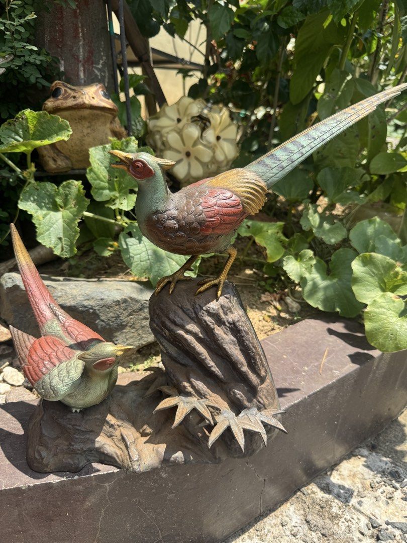 Vintage Bronze Pheasant Bird Figurine Set (Category: Figurines & Statues) located in Cainta. Submitted by danica010314 (Listing ID 1451070381, Image 1). Description: - Set of two bronze pheasant figurines. - One pheasant perched on a rock, the other on a smaller stone. - Features detailed feathers and lifelike expressions. - Adds a classic, elegant touch to any room. - Ideal for collectors of figurines or decorative art..