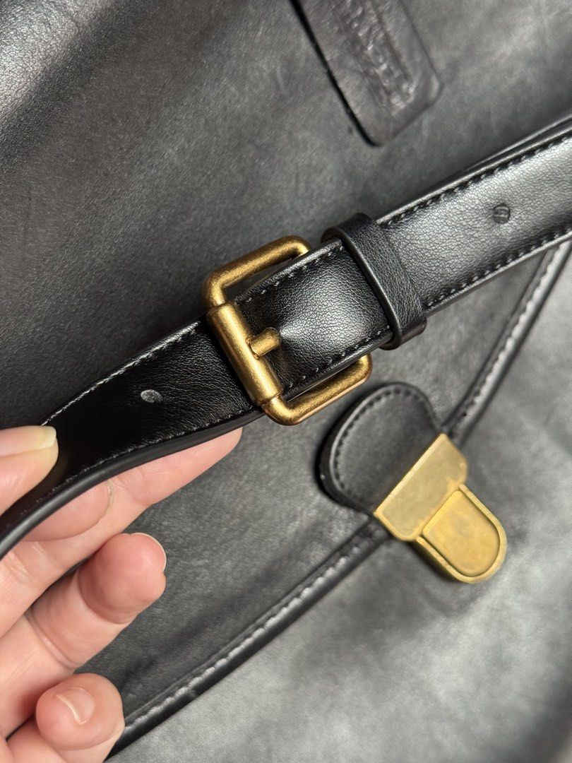 Rare Vintage Coach Leather briefcase (Category: Luxury Bags & Wallets) located in Paranaque City. Submitted by mykindofclothing (Listing ID 1450964058, Image 3). Description: Authentic Vintage Coach briefcase. produced in the early to mid-1990s. Black leather, Made in USA. Secure clasp, adjustable strap. Spacious interior. Shows nice patina. Classic professional style. Well maintained with Bickmore 4 leather conditioner. Leather feels buttery and