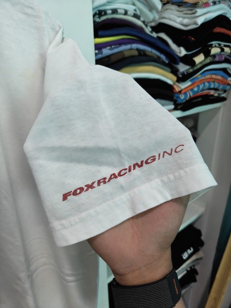 Vintage White Fox Racing Tee (Category: Tshirts & Polo Shirts ) located in Quezon City. Submitted by lancelooot (Listing ID 1451009913, Image 3). Description: - Brand: Fox Racing Inc. - Color: White - Sleeve Length: Short-sleeved - Graphic: American flag with Fox logo on the front - Branding: On sleeve and back - Size: L 22x30 - Condition.