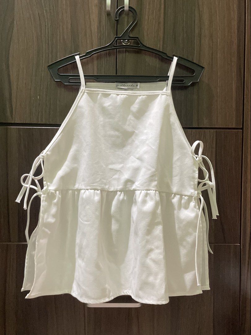 White Linen Camisole Peplum Top (Category: Sleeveless) located in Marikina City. Submitted by bbabang0 (Listing ID 1450991510, Image 1). Description: - premium linen fabric - Adjustable side tie rfs: too big for me.