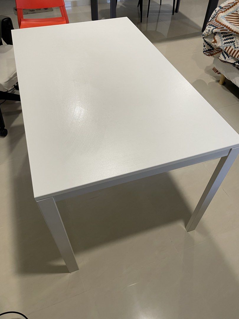 White Rectangular Dining Table (Category: Tables & Sets) located in Singapore. Submitted by moumoumoumi (Listing ID 1451079880, Image 1). Description: - Simple white rectangular table -Accessories such as screws will be provided - Versatile: Use as a work desk or dining - Sturdy legs for stability - Easy-to-clean surface - Space-saving design, great for small homes -Self collect at choa chu kang -Dismantled and Packed in bubble wrap, easy to arra