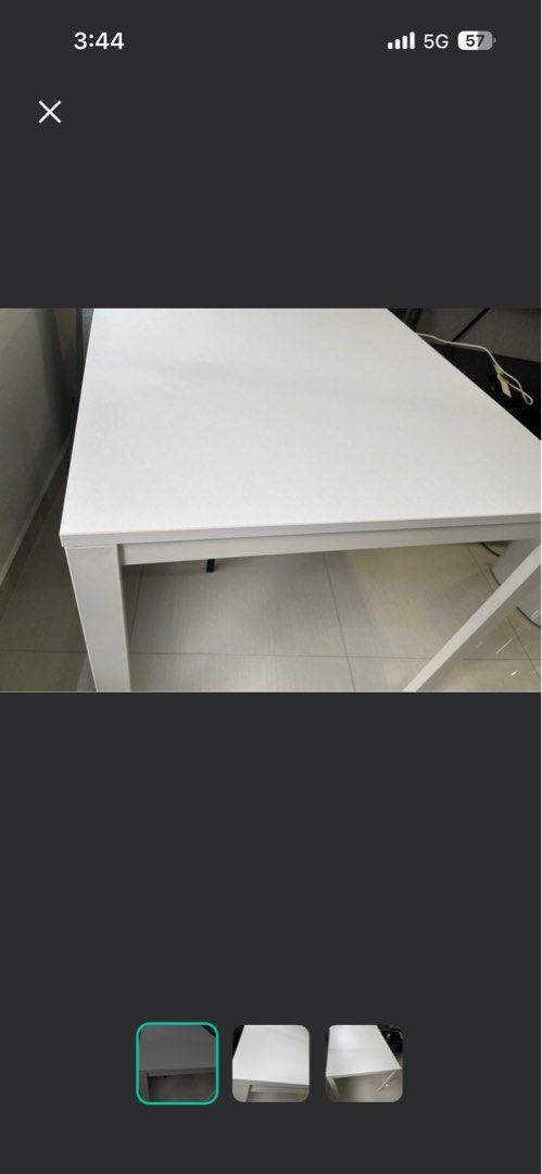 White Rectangular Table (Category: Tables & Sets) located in Singapore. Submitted by KCO22 (Listing ID 1451010582, Image 3). Description: - Simple white rectangular table - Features four sturdy legs for stability - Perfect for dining or as a work desk - Easy-to-clean surface - Fits well in most spaces - Selling due to relocation - 120x 60 sizes .