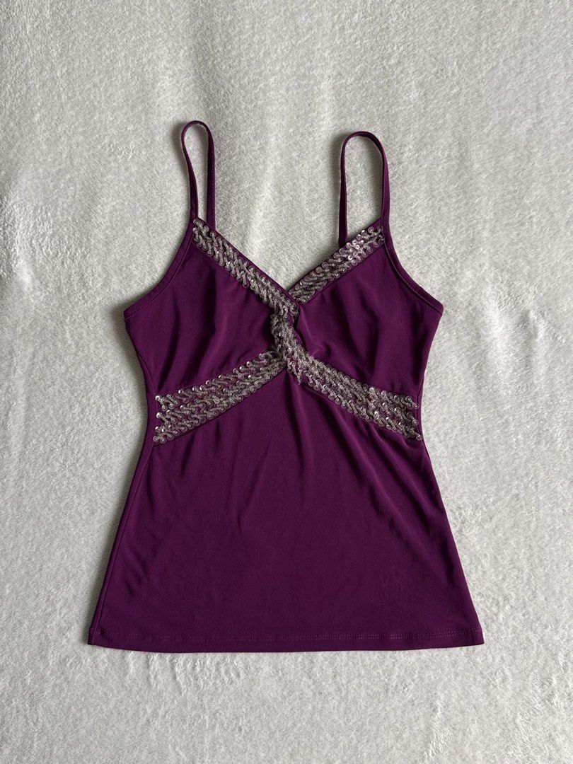 Y2K Purple Embellished Spaghetti Strap Tank Top (Category: Sleeveless) located in Quezon City. Submitted by thecurvycorner (Listing ID 1450964367, Image 1). Description: - Has stretchy fabric can fit up to Medium size.