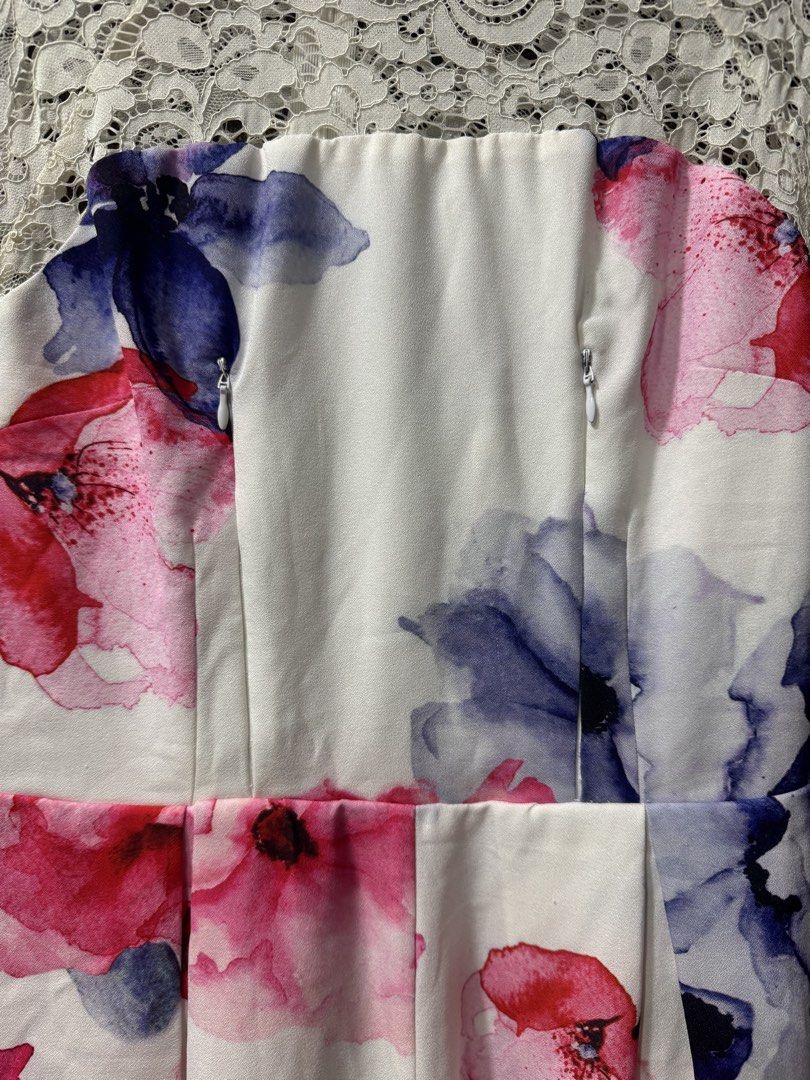 Breastfeeding dress Size M (Category: Rompers) located in Guiguinto. Submitted by thehiddenwardrobe (Listing ID 1451108056, Image 2). Description: - White romper with bold pink and blue floral print - High neckline with white lace overlay - Short lace sleeves - Back zipper closure - Size M - Light blue midi dress from Love Zalora - Features intricate floral lace overlay - Delicate sheer neckline - Beige lining for coverage - breastfeeding dress (