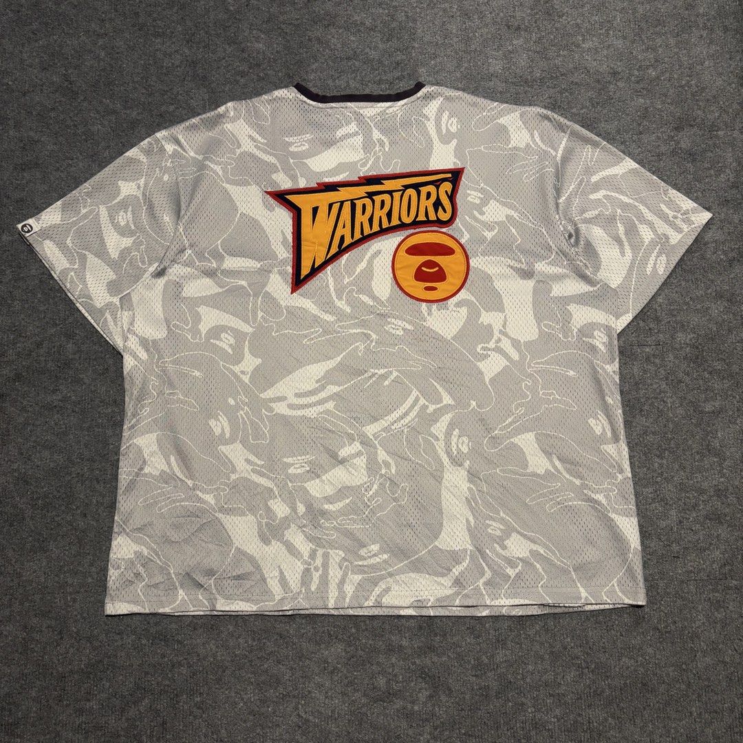 AAPE x Mitchell & Ness Golden State Warriors BP Jersey (Category: Tshirts & Polo Shirts ) located in Dagupan City. Submitted by thrift2dy. (Listing ID 1451170122, Image 2). Description: Width: 27” Length: 28” Condition: 7/10 Issue: Discoloration of neckline, loose neckline, unnoticable loose stitching .