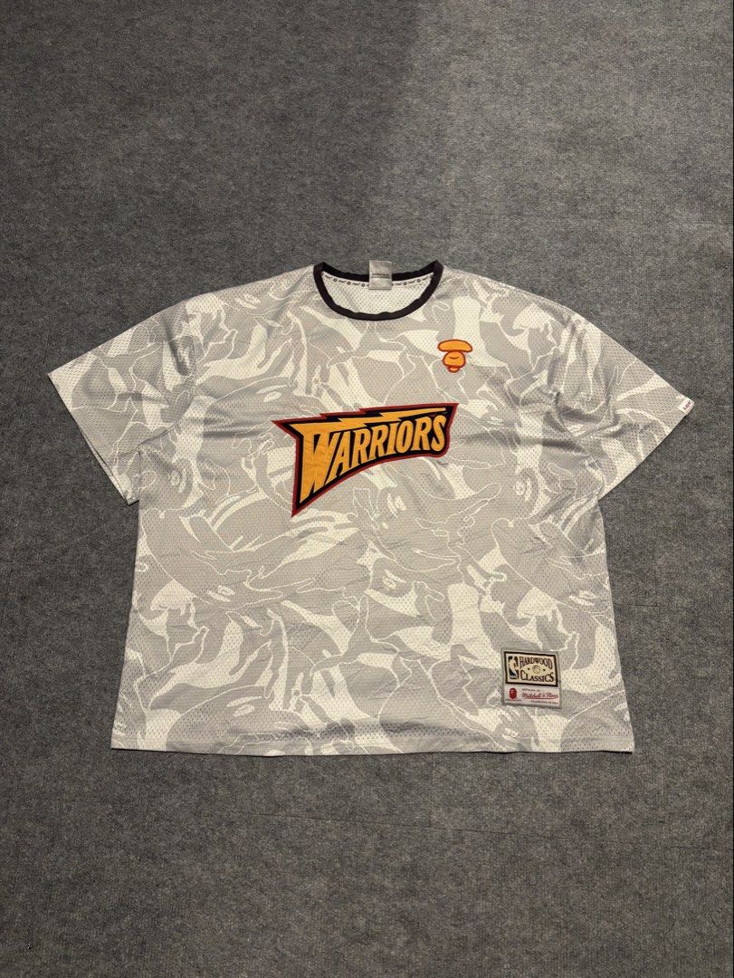 AAPE x Mitchell & Ness Golden State Warriors BP Jersey (Category: Tshirts & Polo Shirts ) located in Dagupan City. Submitted by thrift2dy. (Listing ID 1451170122, Image 1). Description: Width: 27” Length: 28” Condition: 7/10 Issue: Discoloration of neckline, loose neckline, unnoticable loose stitching .