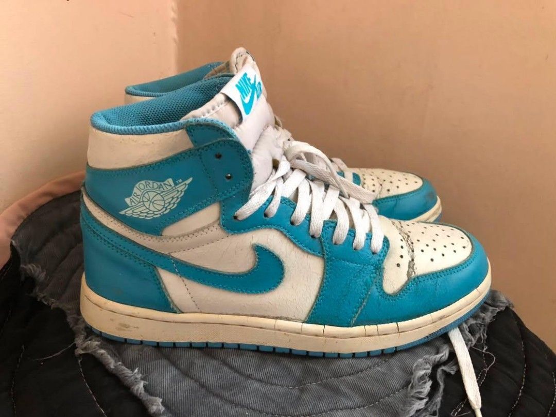 Air Jordan 1 High OG "UNC" (Category: Sneakers) located in Manila. Submitted by macchi1216 (Listing ID 1451179844, Image 3). Description: - Classic Air Jordan 1 High OG UNC - White and baby blue leather - Iconic silhouette, great for collections - Pre-owned with signs of wear, still wearable - Please check photos for condition details.