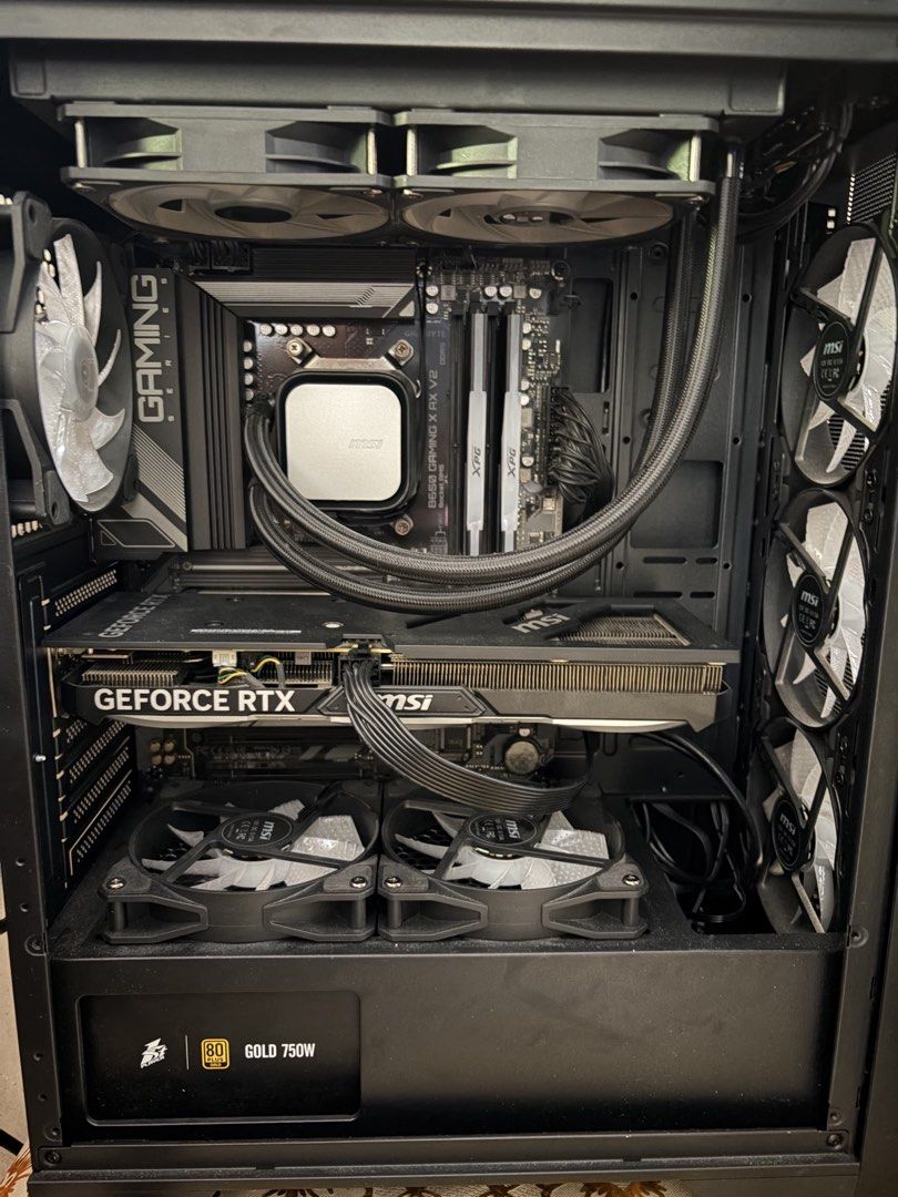 AM5 Gaming PC (Category: Desktops) located in Manila. Submitted by edwarddece66406 (Listing ID 1451292037, Image 1). Description: MOBO: Gigabyte B650 Gaming AX V2 RAM: XPG Lancer 2x16GB 6000MTS (EXPO & XMP) CPU COOLER: MSI MAG Coreliquid 240 CPU: Ryzen 5 7600 PSU: 1ST Player Steampunk 750W Gold SSD: MSI M450 500GB All comes with boxes and accessories .
