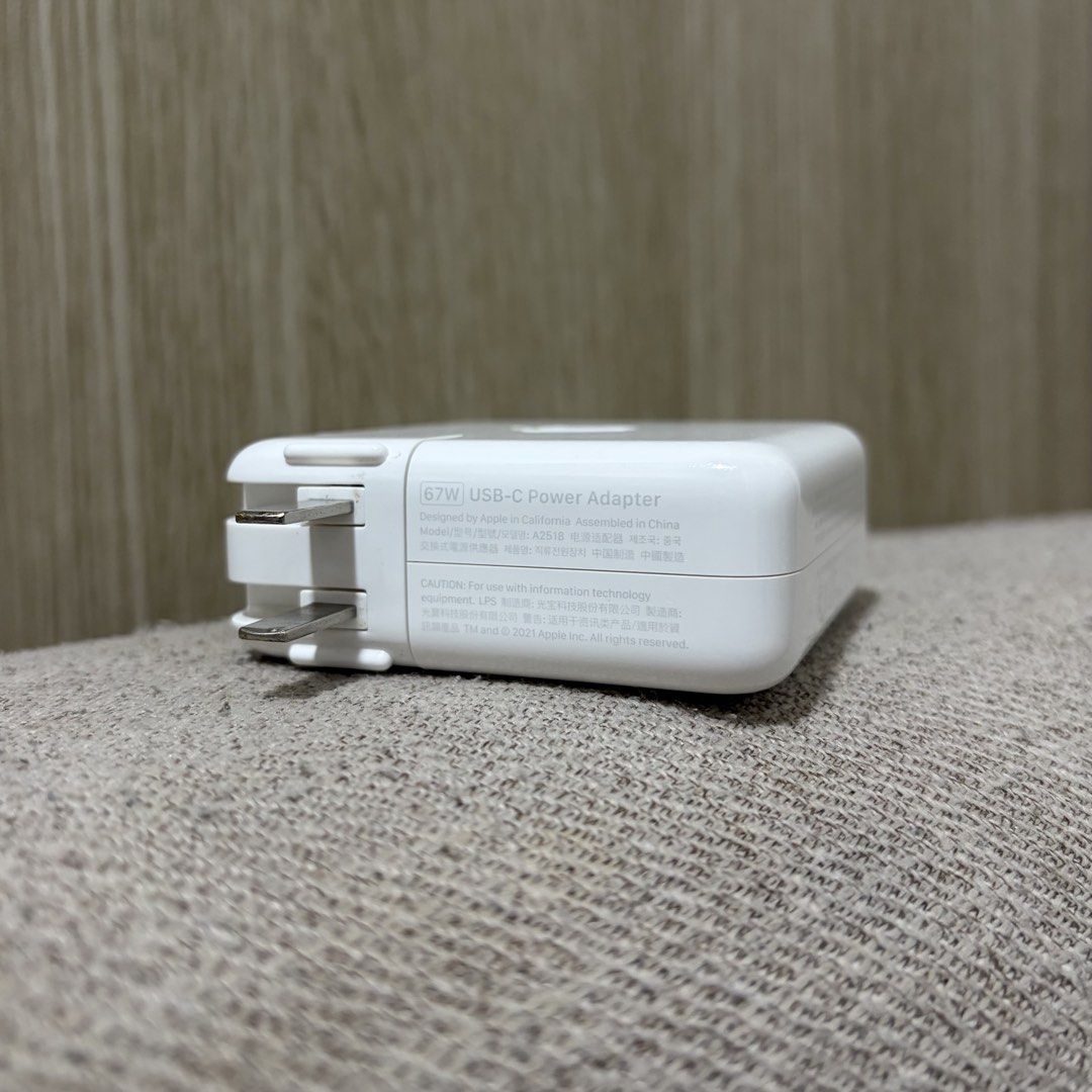 Apple 67W USB-C Power Adapter (Category: Chargers & Cables) located in Taguig. Submitted by cee.declutters (Listing ID 1451253161, Image 2). Description: Apple 67W USB-C Power Adapter Model: A2518 Fast-charger Input: 100-240V Output (USB PD): 20.3V-3.3A/ 15V-3A/ 9V-3A/ 5.2V-3A Condition: Normal signs of usage. No performance issues. Pick-up in Taguig or shipping anywhere via Lalamove/Grab/J&T. SF c/o buyer..