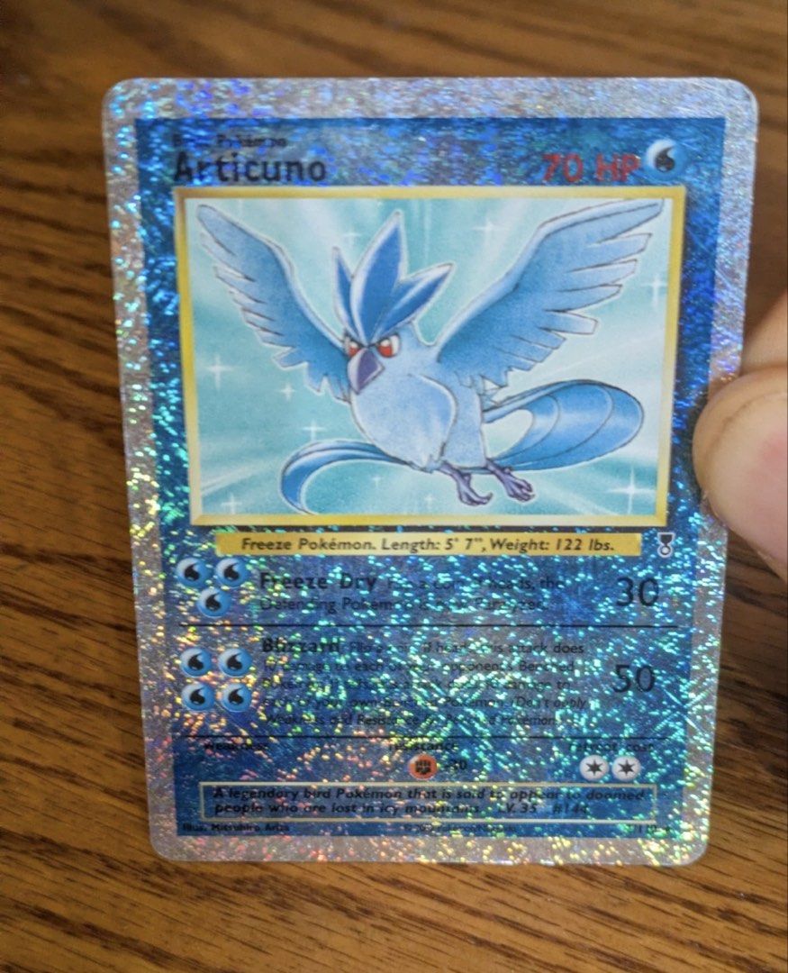 Articuno 2/110 Legendary Collection Reverse Holo MP-HP (Category: Toys & Games) located in Shah Alam. Submitted by osidfray (Listing ID 1451248969, Image 1). Description: - Vintage Rev Holo Articuno Pokemon Card - Type: Basic Pokemon - HP: 70 - Attacks: Freeze Dry, Blizzard - Retreat Cost: 2 Colorless Energy - Illustrator: Mitsuhiro Arita - A legendary bird Pokemon.